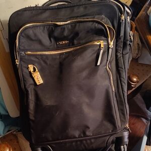 Tumi Black Travel Backpack with Gold Zippers